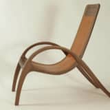 Armchair made from Nutt - wood and leather